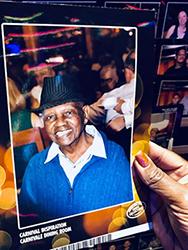 Cynthia's hand holding a picture of her father