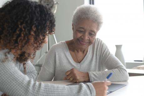 Older woman and family member talking about advance care planning