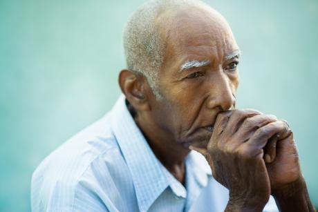 Portrait of contemplative older Black man
