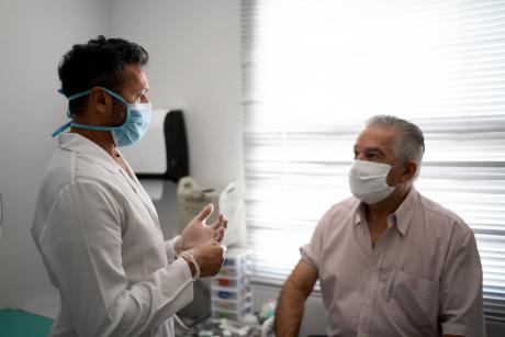 Doctor talking to patient