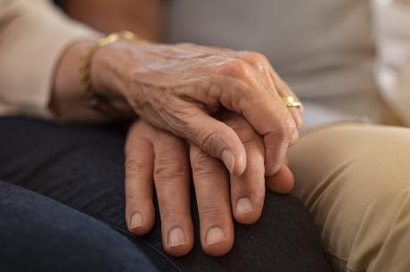 close of of couple holding hands