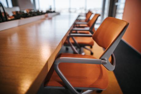 chairs at board table