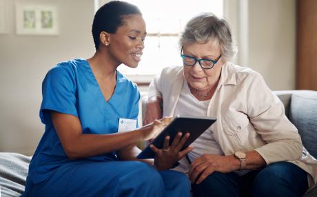 LTC resident talking with care manager