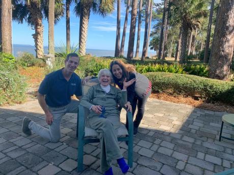 Mark Piegza and Julia Marshall pose with Jeanette Cram