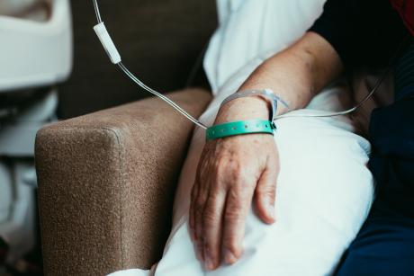 Hand of person getting a drug infusion
