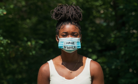 I have a voice on a mask worn by a young black woman protestor