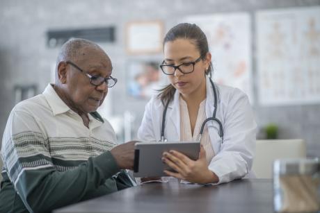 Doctor assessing patient