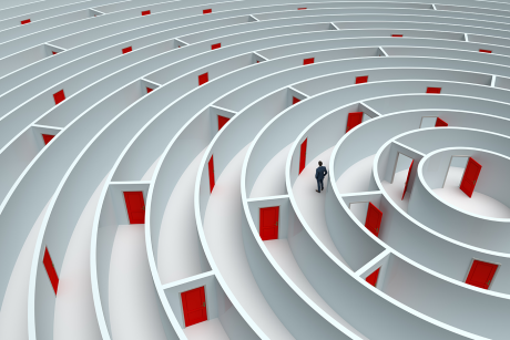 Man confused in white maze with red doors