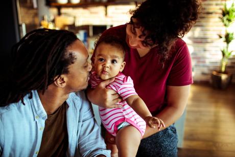 Young black couple with baby