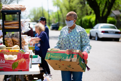 Woman working at a food pantry
