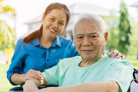 Older man with daughter caregiver