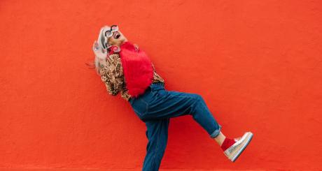 Older woman wild glasses, red sweater